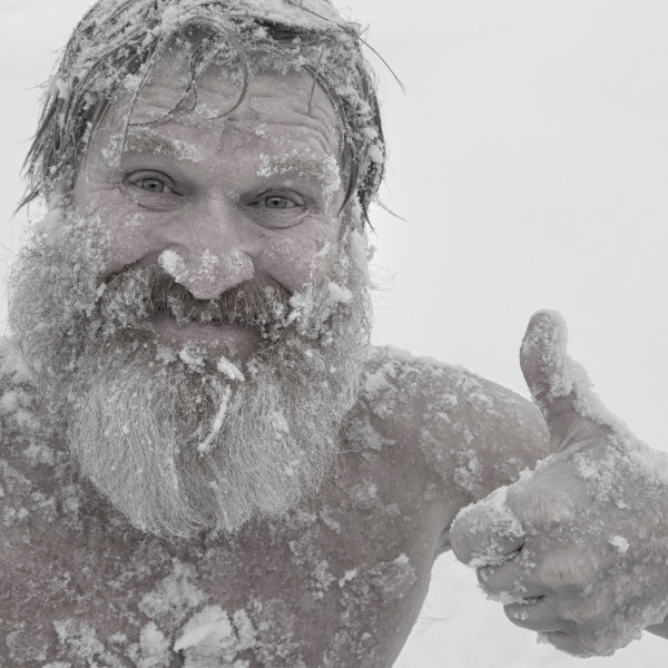 Man enjoying cold weather with thumbs up